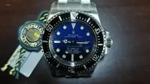 High-quality clone Rolex dive watch with blue dial and stainless steel band.