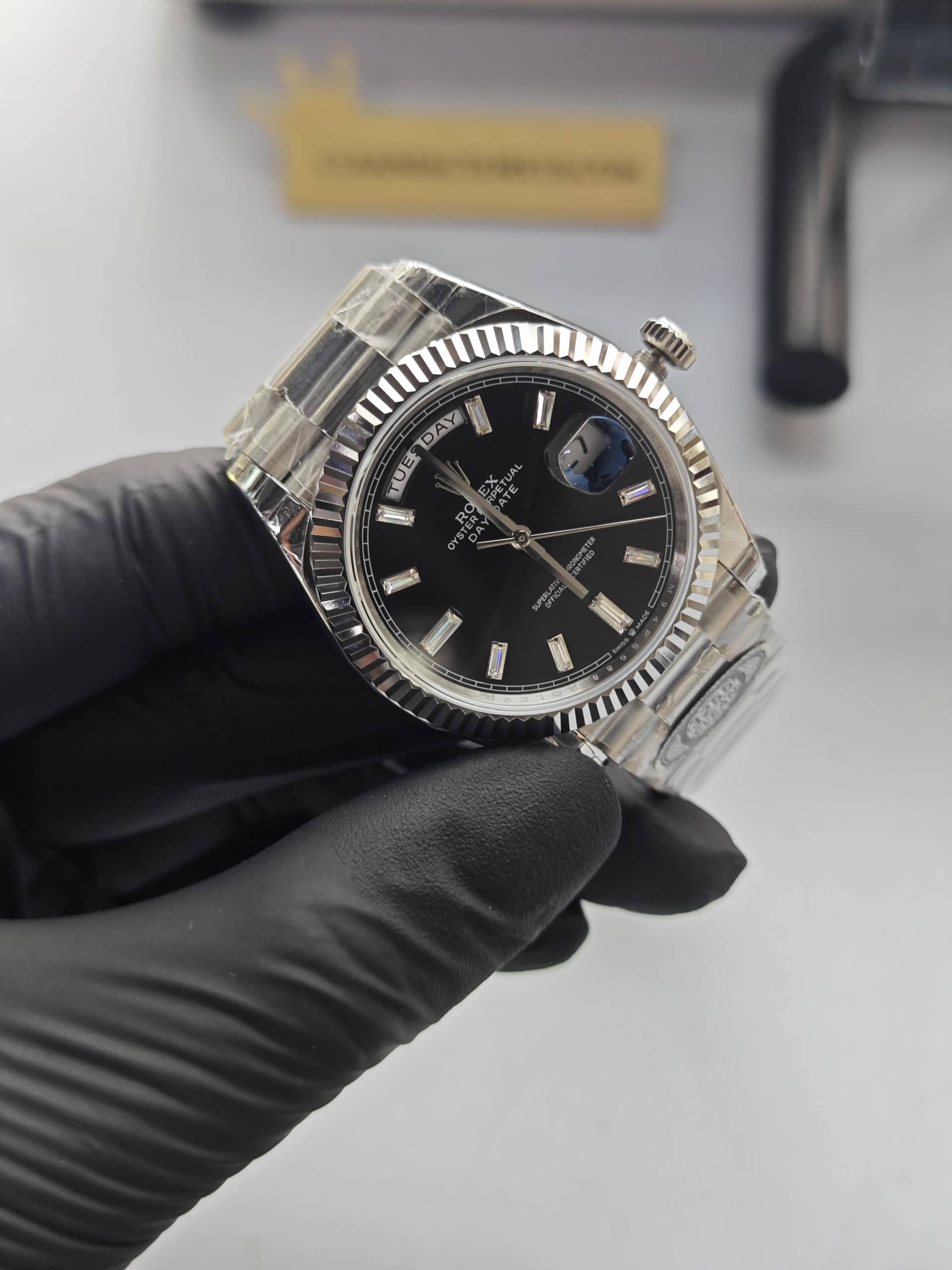Clean Factory Rolex Day Date 40mm 228239 President Black Dial with Baguette Platinum Wrapped Fluted Bezel
