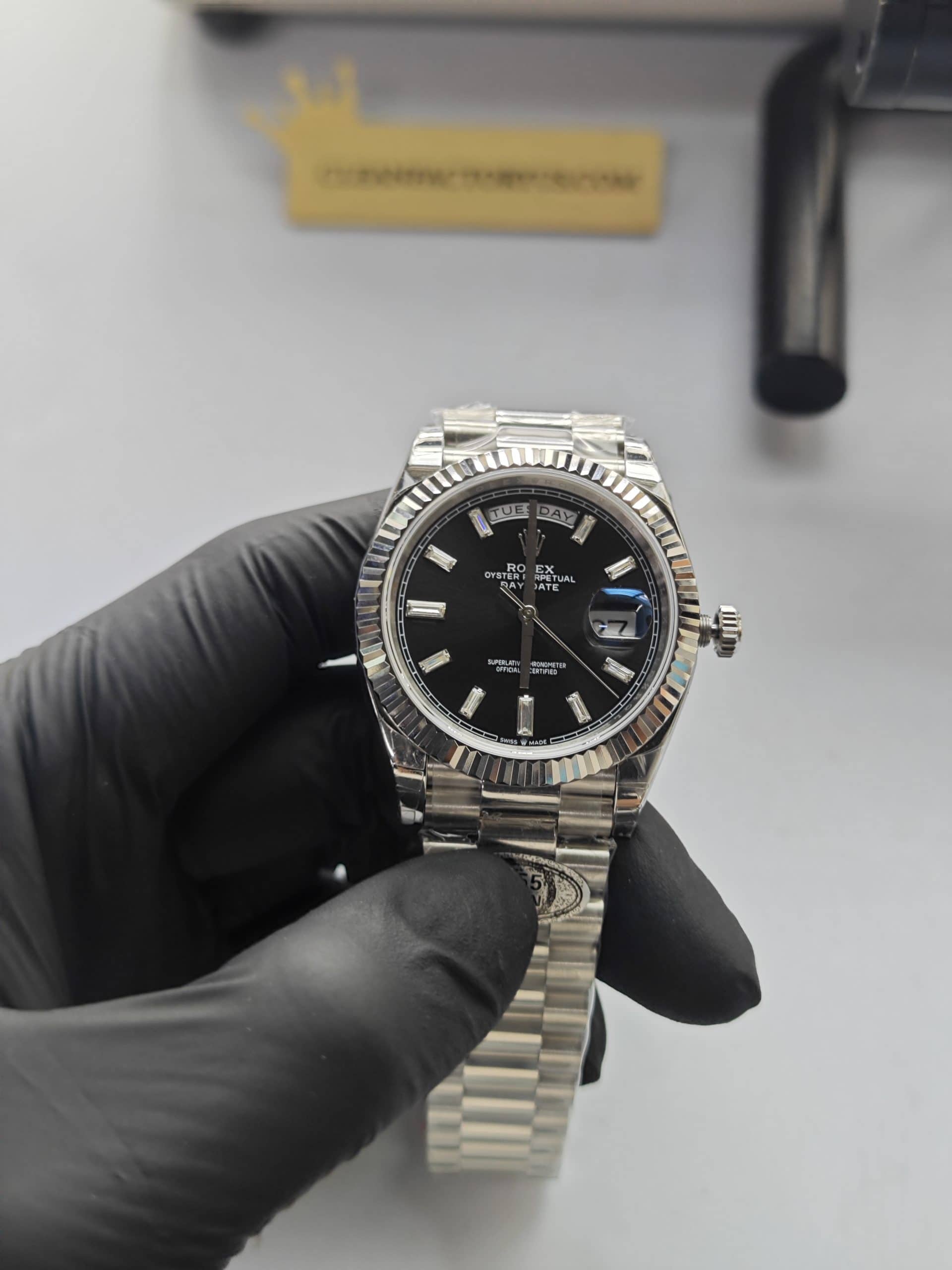 Clean Factory Rolex Day Date 40mm 228239 President Black Dial with Baguette Platinum Wrapped Fluted Bezel