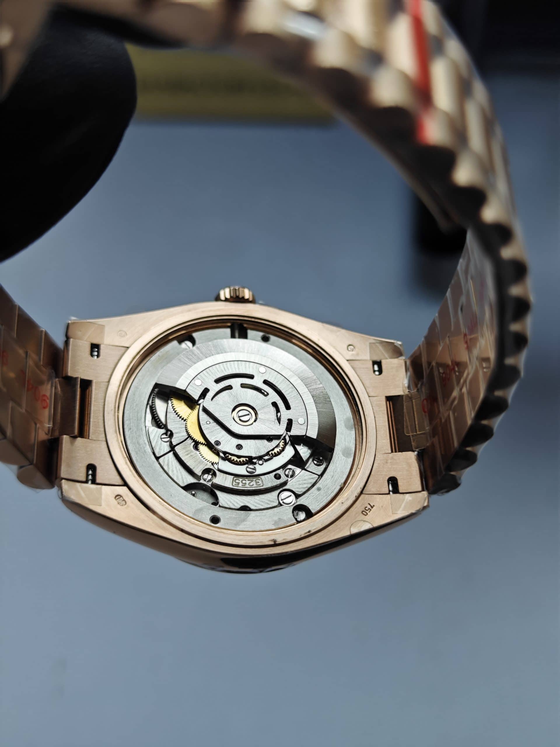Clean Factory Rolex Day-Date 40mm 228235 President , Eisenkiesel Dial with Baguette Diamonds, Rose Gold Fluted Bezel