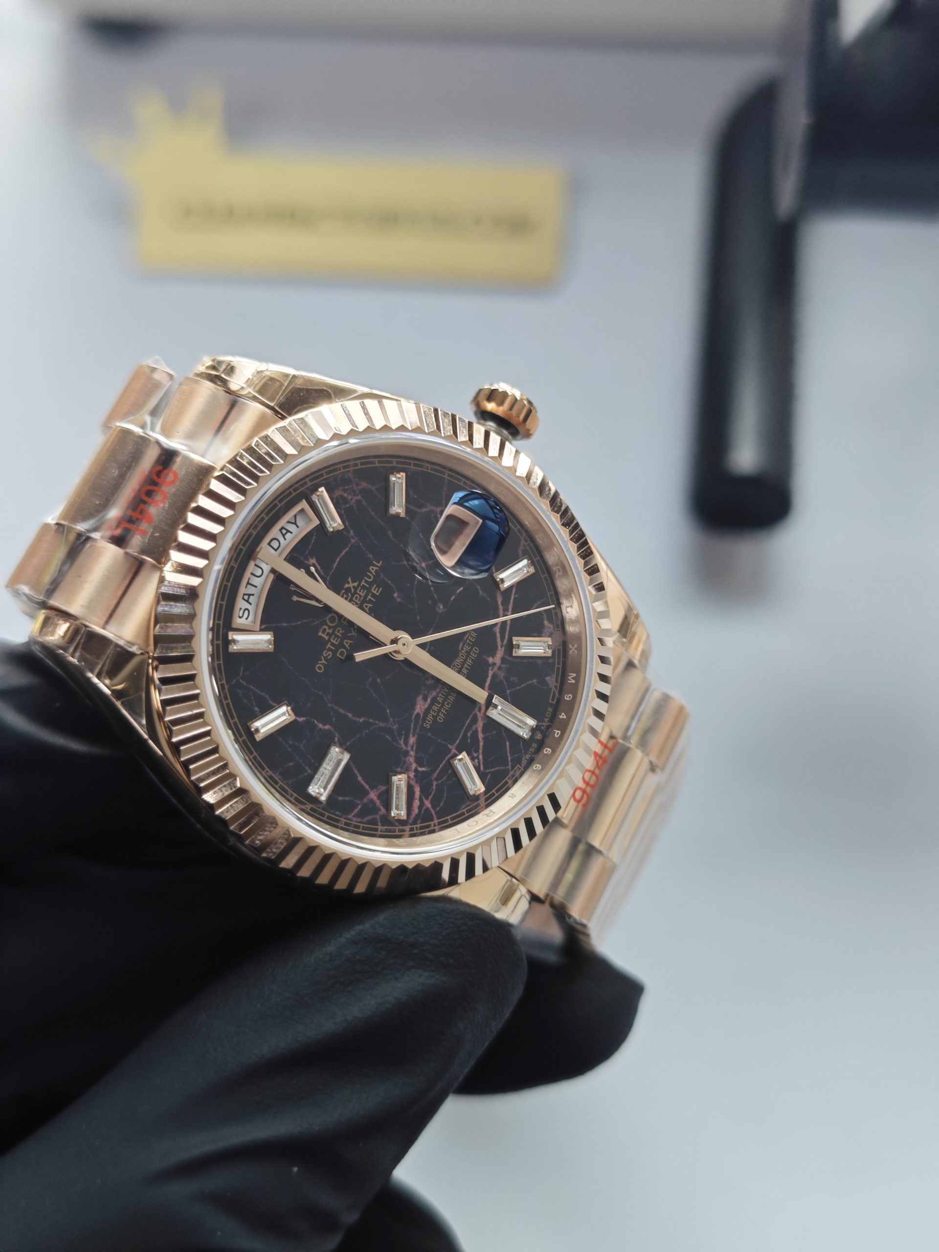 Clean Factory Rolex Day-Date 40mm 228235 President , Eisenkiesel Dial with Baguette Diamonds, Rose Gold Fluted Bezel
