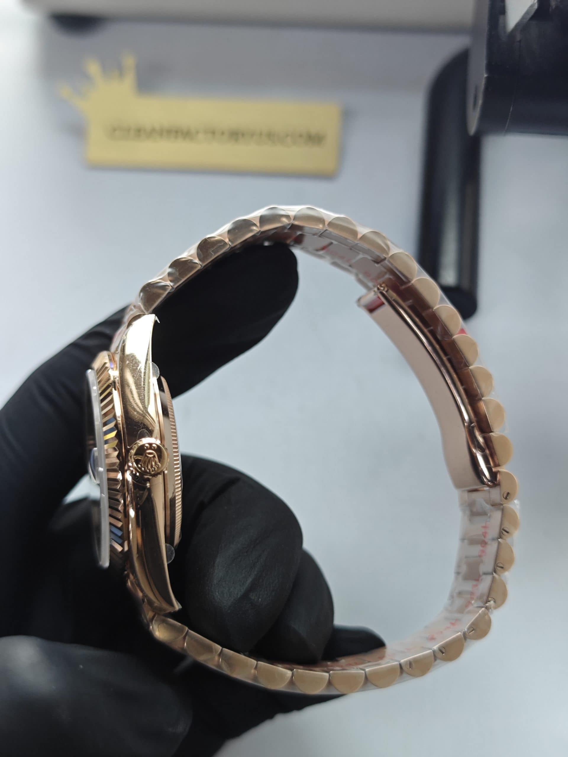 Clean Factory Rolex Day-Date 40mm 228235 President , Eisenkiesel Dial with Baguette Diamonds, Rose Gold Fluted Bezel