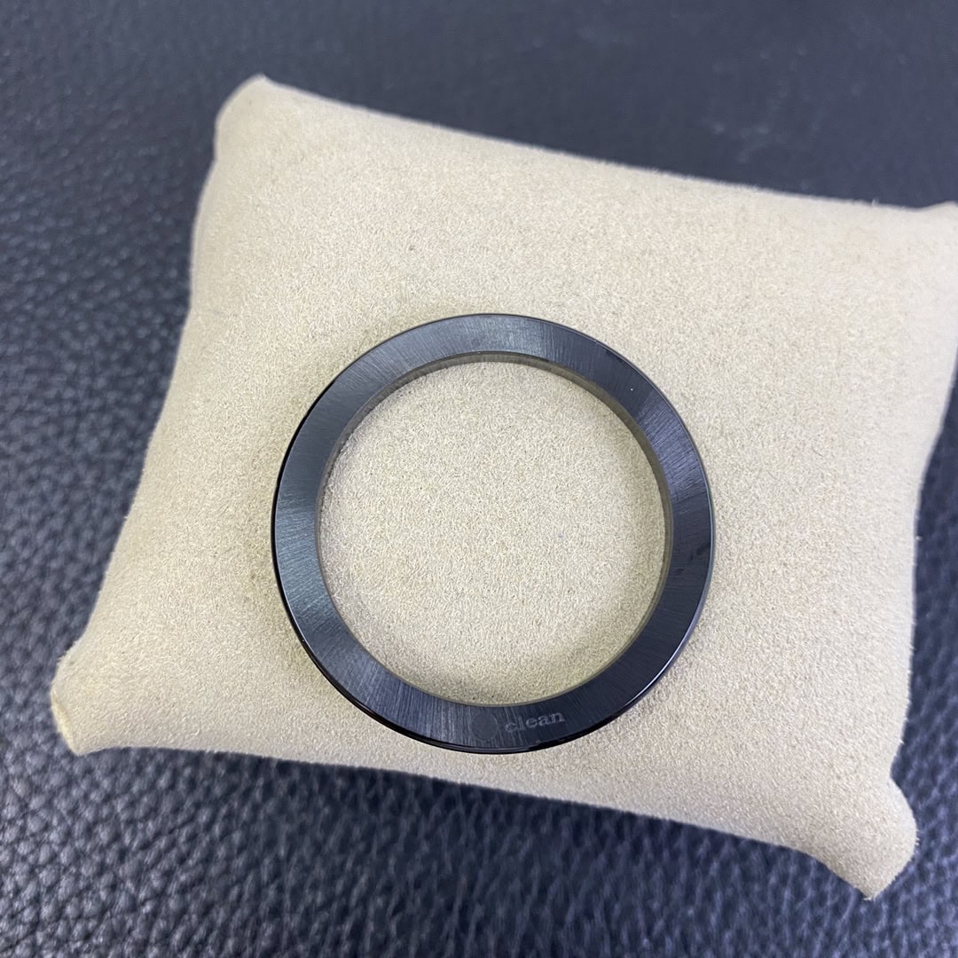 Reverse Side of Clean Factory Black Ceramic Bezel Showing Authentic Laser Logo